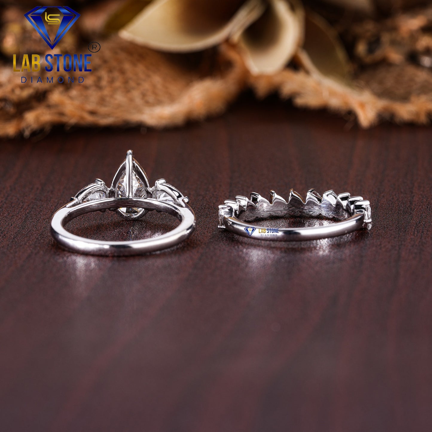 2.58 TDW Pear Cut Women’s Three Stone Diamond Ring with Pear Cut Diamond Band