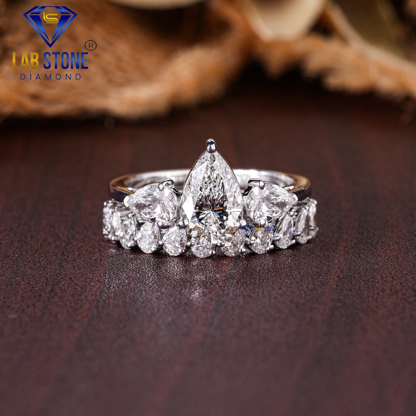 2.58 TDW Pear Cut Women’s Three Stone Diamond Ring with Pear Cut Diamond Band