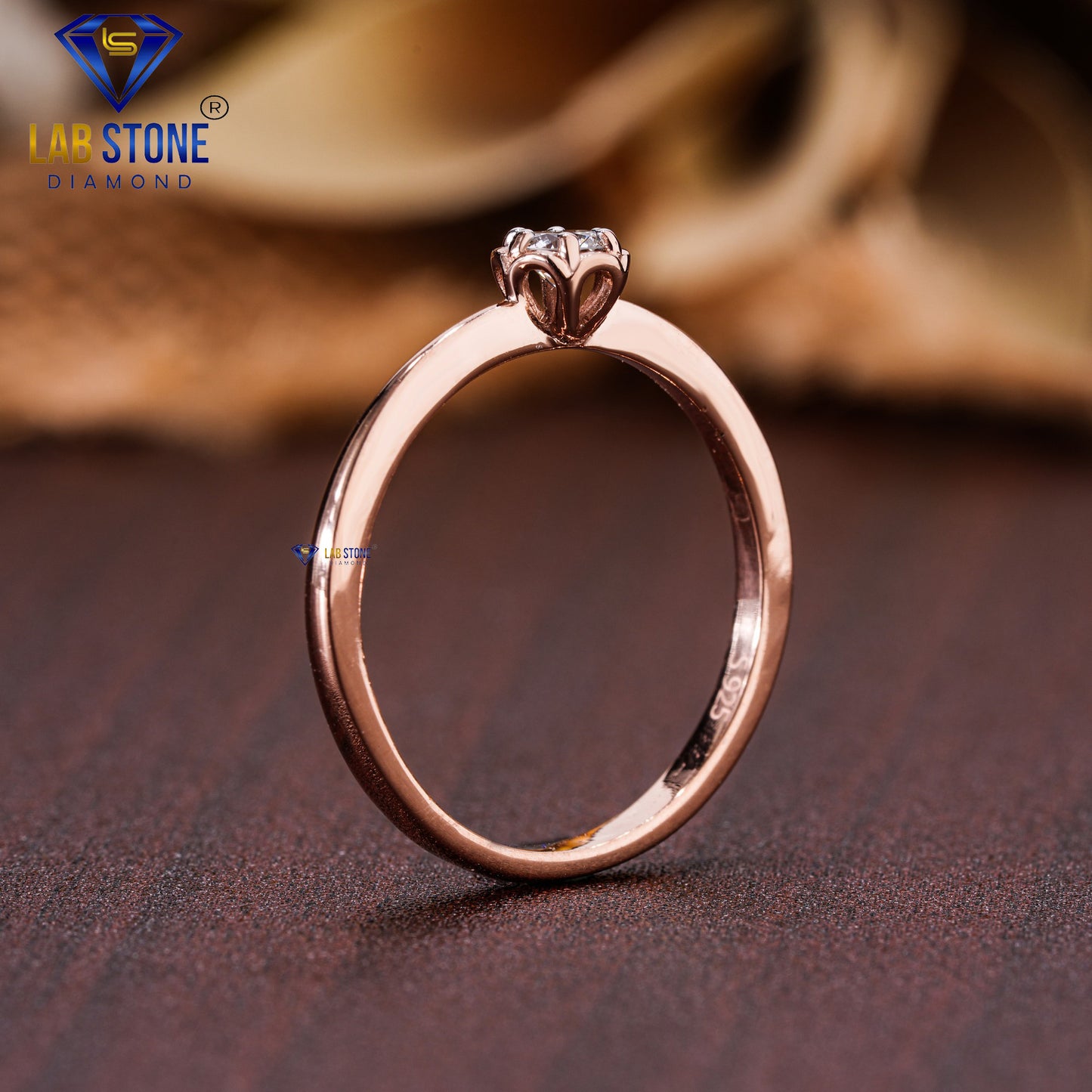 0.12 TDW Round Cut Diamond Women’s Solitaire Ring