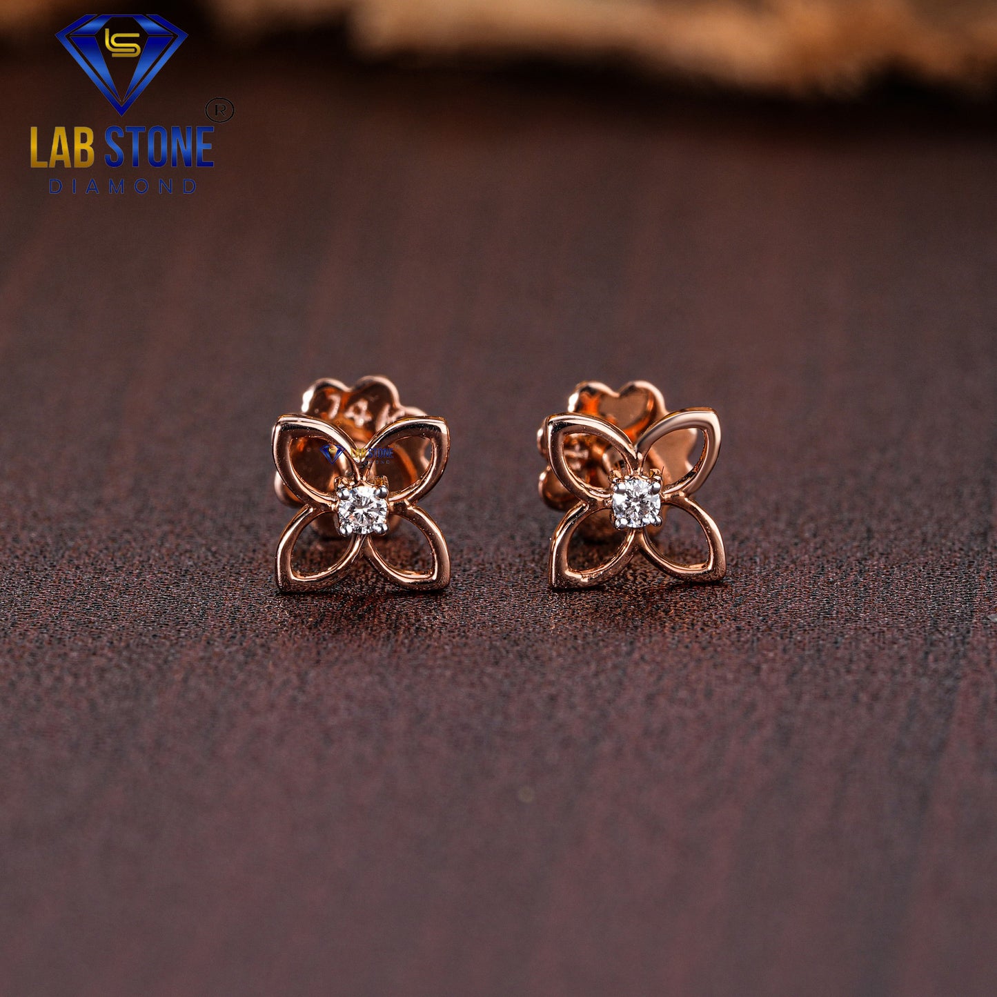 0.03 TDW Round Cut Diamond Solitaire Stud Earring