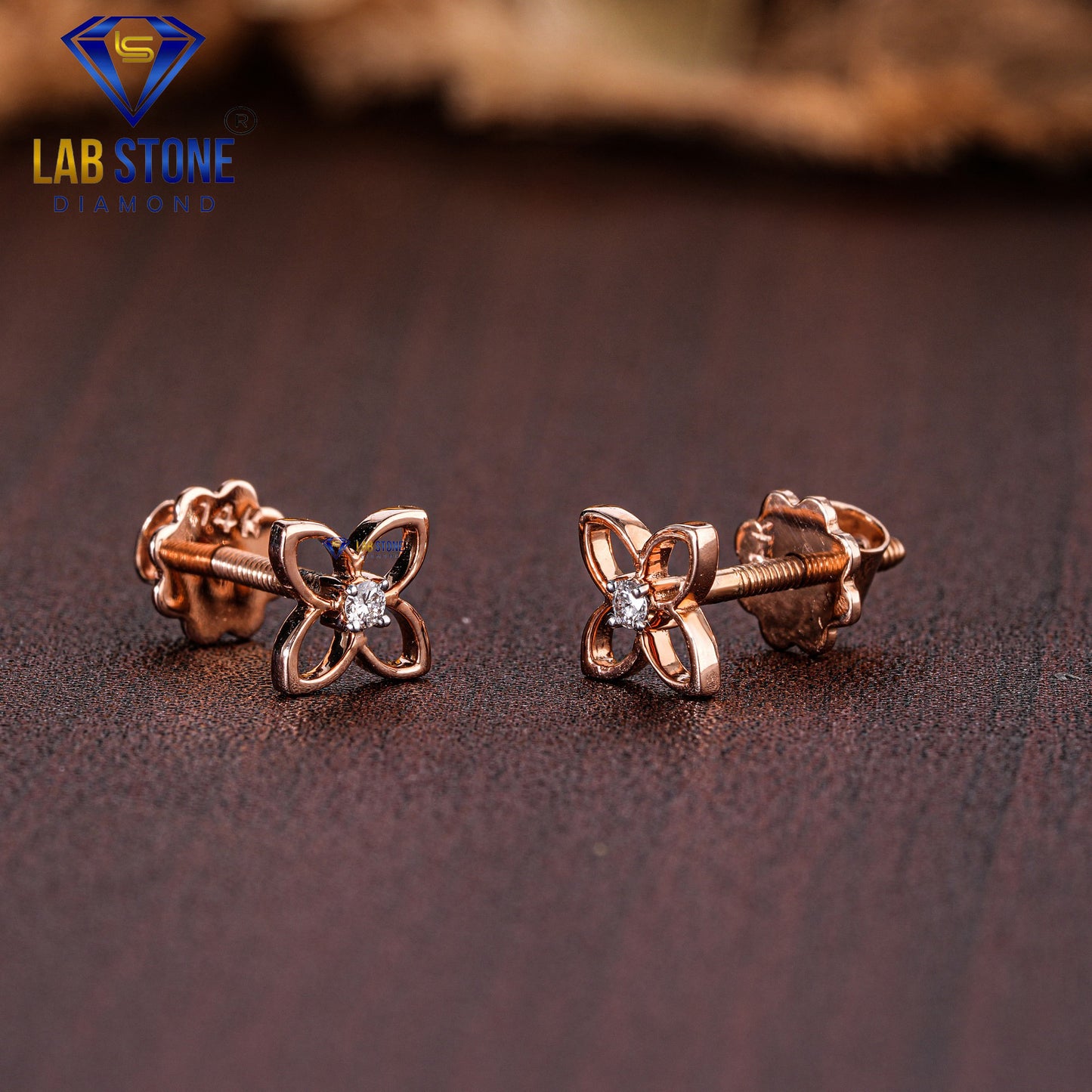 0.03 TDW Round Cut Diamond Solitaire Stud Earring