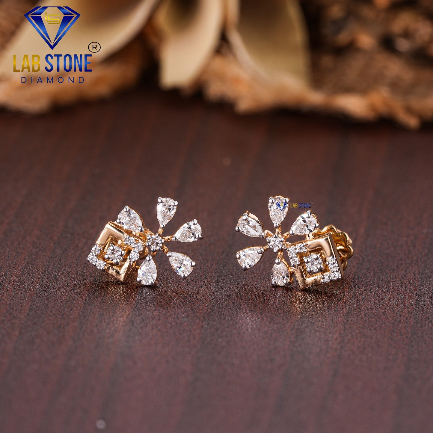 0.53 TDW Round & Pear Cut Diamond Stud Earring