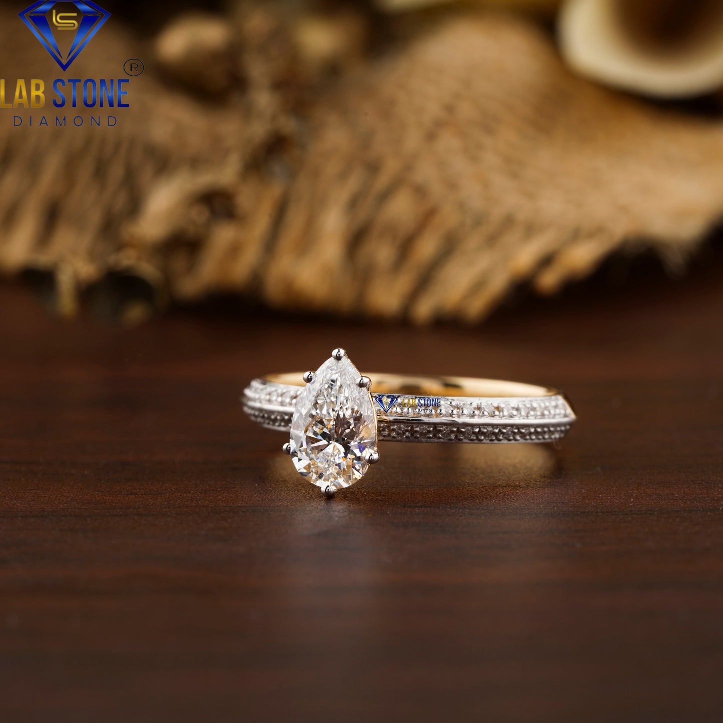 0.96 TDW Pear & Round Cut Diamond Women's Ring