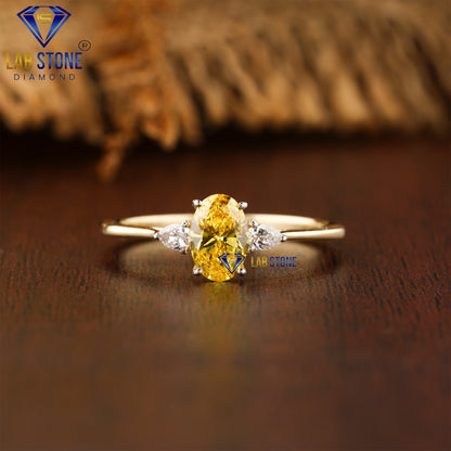 0.78 TDW Fancy Yellow Oval & Pear Cut Diamond Women’s Three Stone Ring